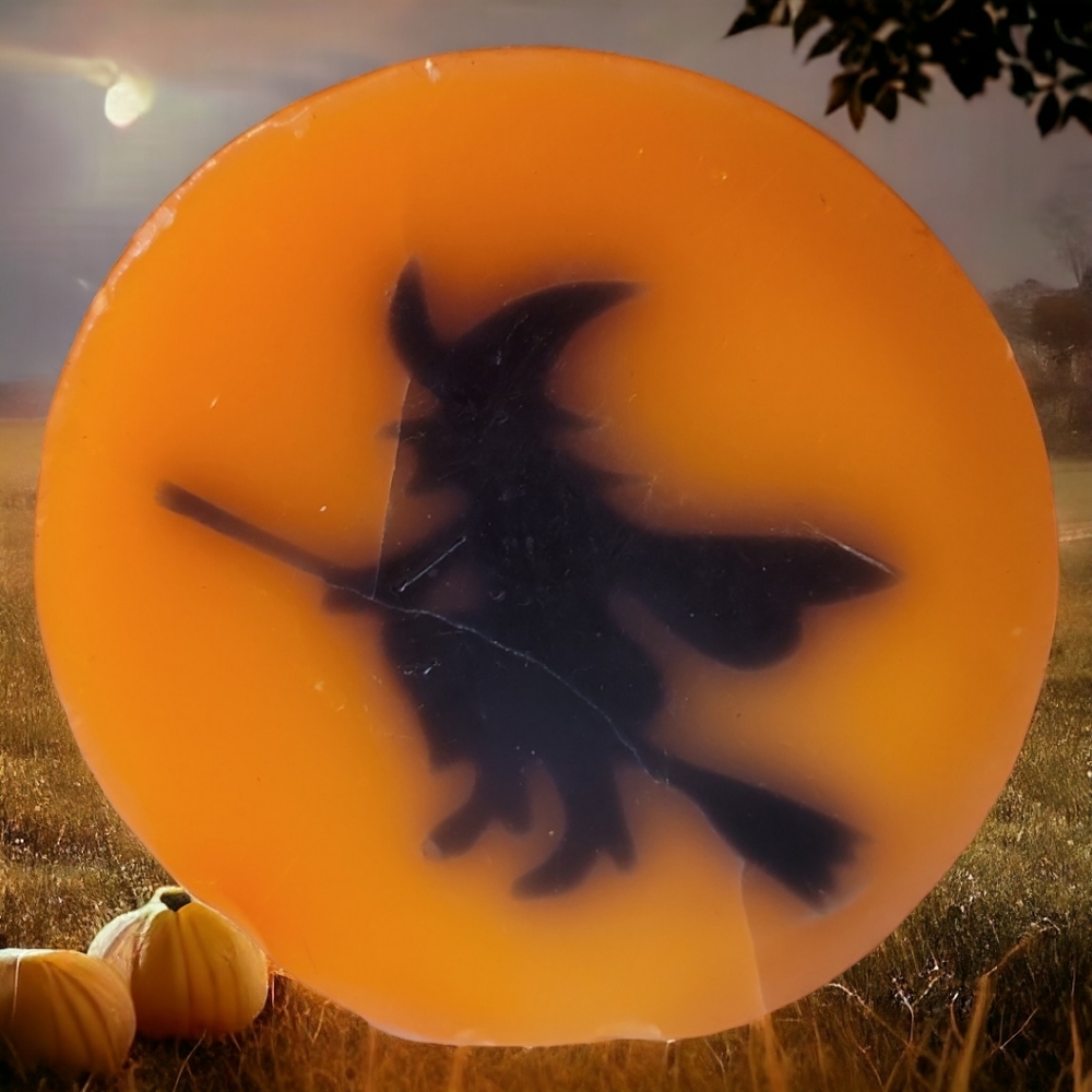 Vtg Silhouette Witch Flying On Broom Orange Solid Wax Candle Round